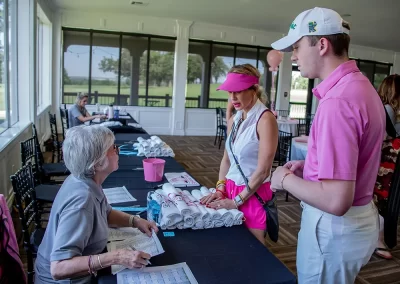 A young man and woman talking with an older woman