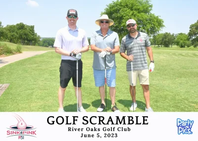 Three white males outdoors wearing hats and sunglasses. Each one is holding a golf club.