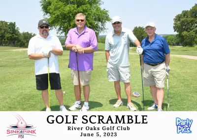 four white males at the 2023 golf scramble. Three in sunglasses and one without. All holding golf clubs