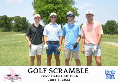 four young men with hats holding golf clubs