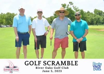 men in bright polos playing golf at golf scramble. one in a straw hat