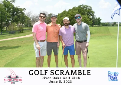 four male friends in light colored shirts at golf scramble