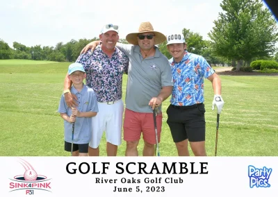 4 men and 1 boy with golf clubs. Man in the middle has a straw hat