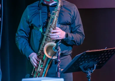 Male musician playing saxophone