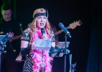 Woman speaking on stage