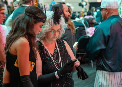 Two women looking at a phone