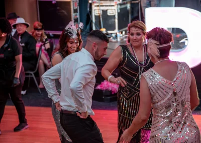 Group of people dancing while dressed in vintage costumes