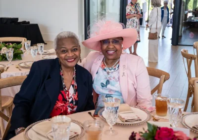 Two women enjoying time together at the 2023 Proton Luncheon