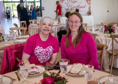 Two women enjoying time together at the 2023 Proton Luncheon