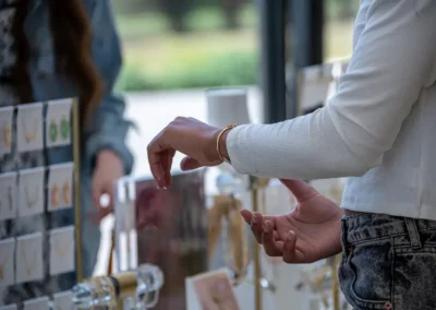 A Kendra Scott bracelet on a woman's wrist